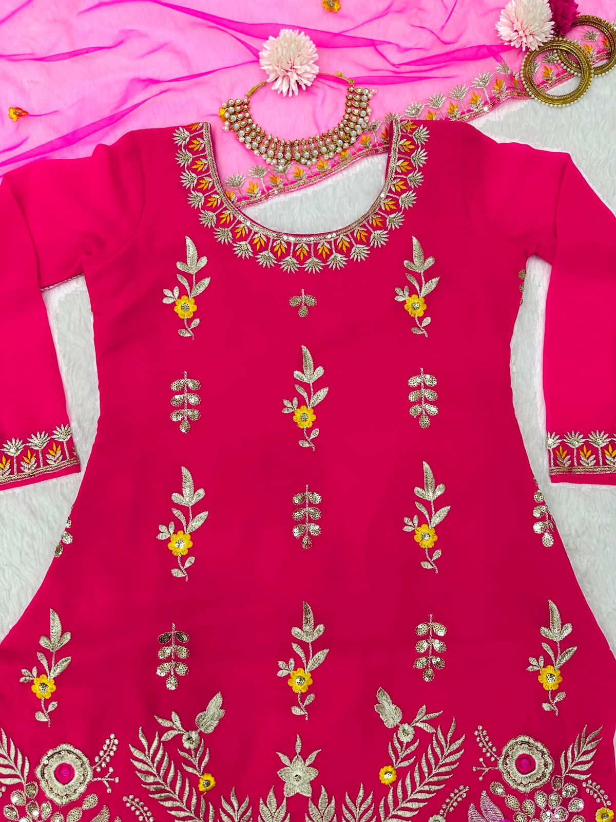 Party wear lehengas with top designs