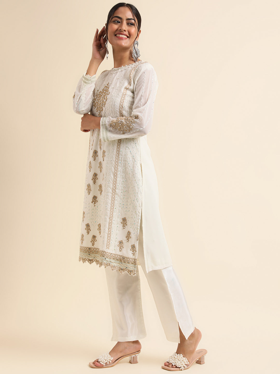 Embrace Timeless Elegance with Off-White Pakistani Suit