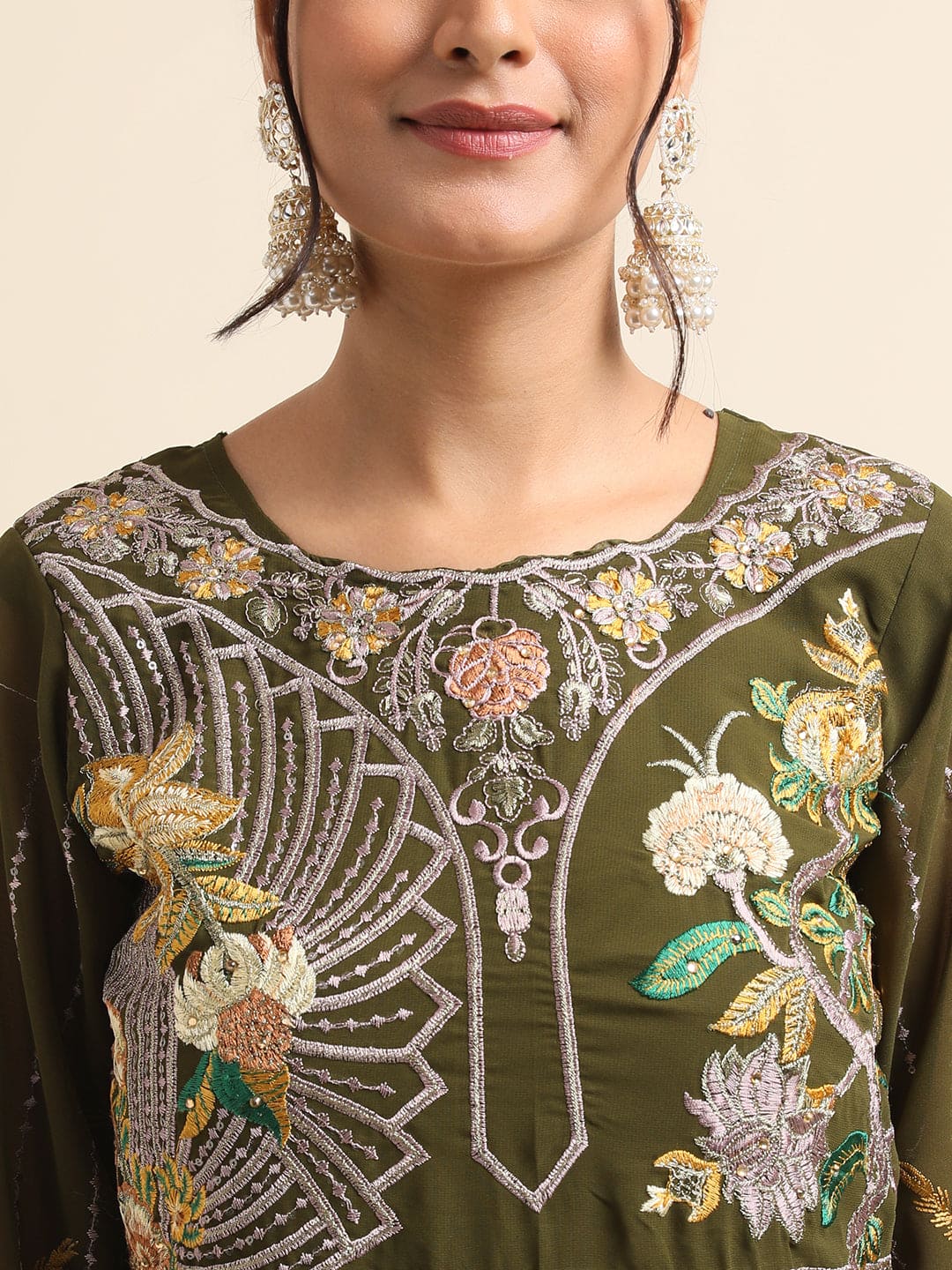 Embrace Elegance with Green Pakistani Suit Design