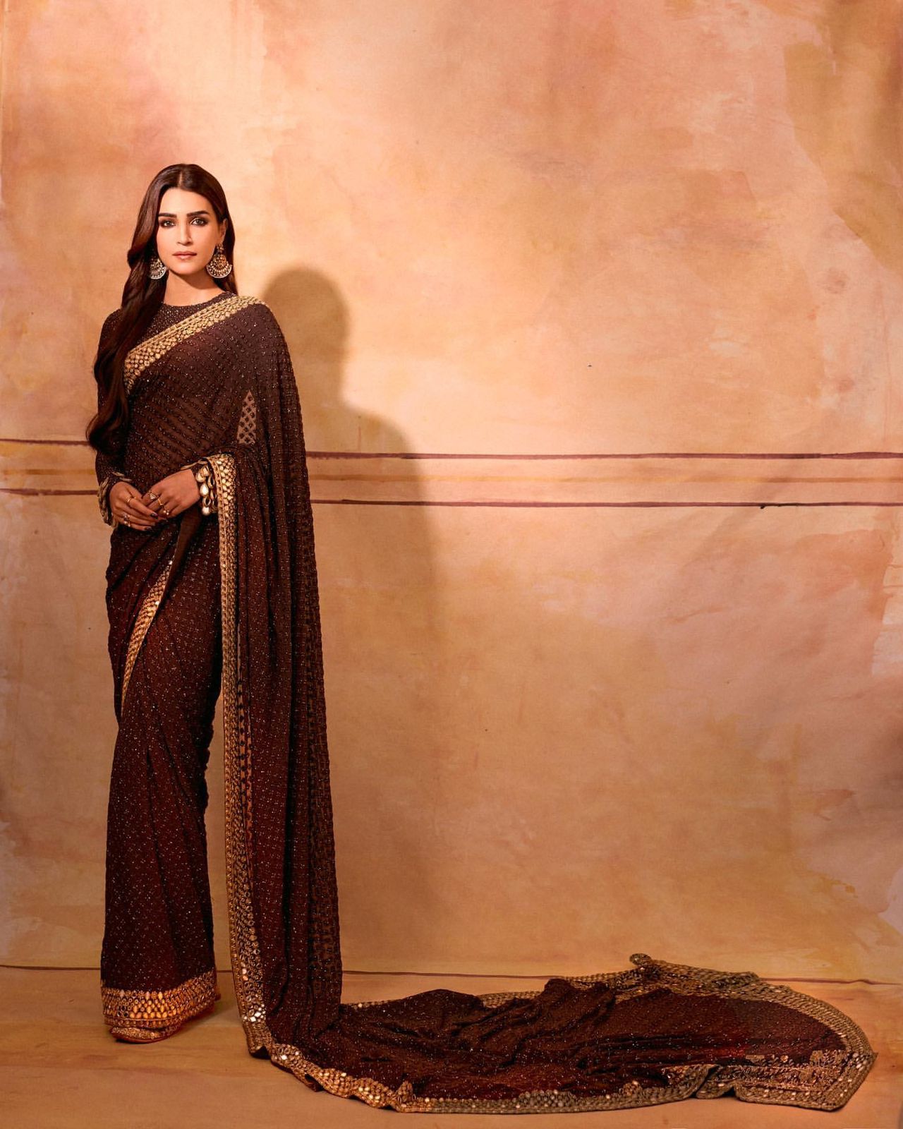 Chocolate and Brown color Georgette sarees with thread and sequin work in  saree with gold zari