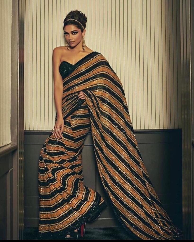 Buy Deepika Padukone’s Gold & Black Color Saree