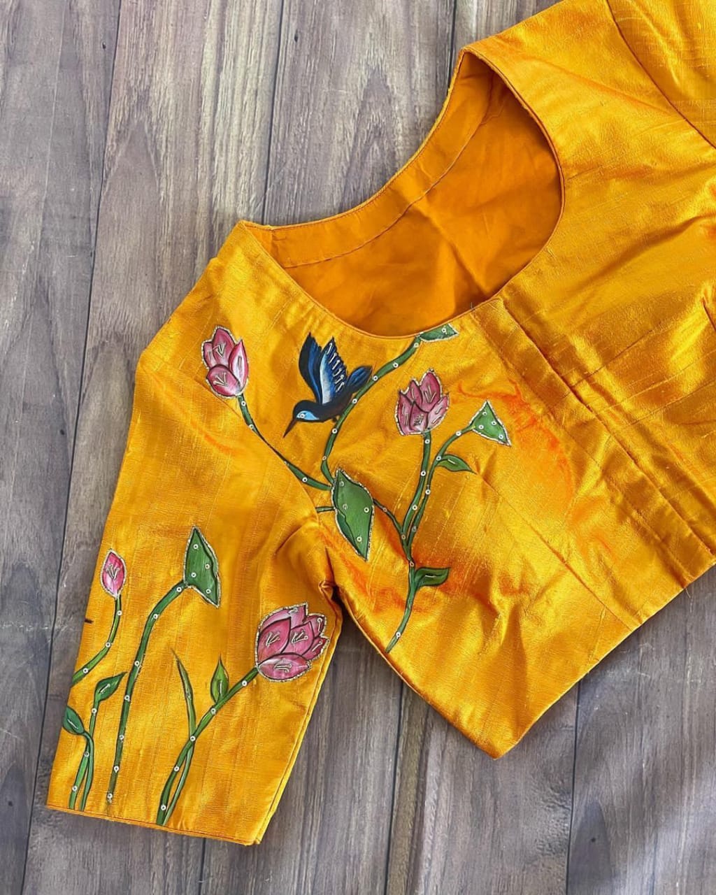 Blouse has print sequance , val and moti and handwork