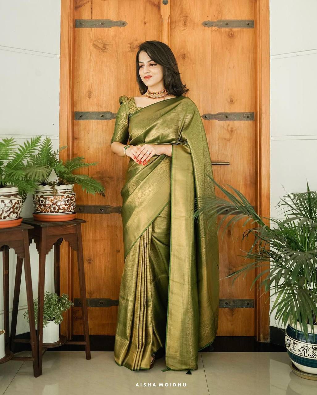 Attractive Green Woven Banarasi Silk Saree With Blouse