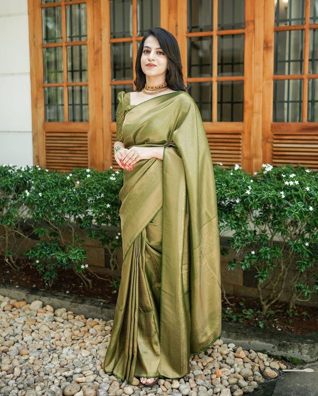 Attractive Green Woven Banarasi Silk Saree With Blouse