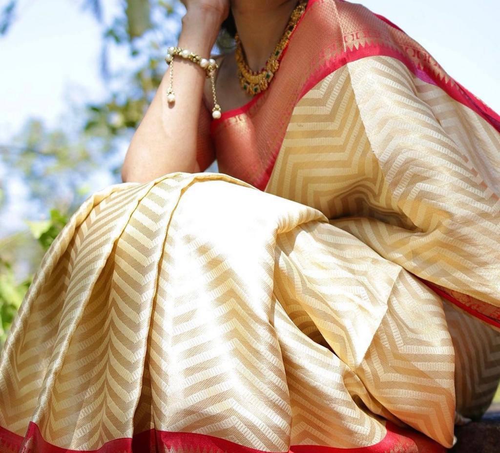 Cream Bridal Woven Banarasi Silk Saree With Red Blouse